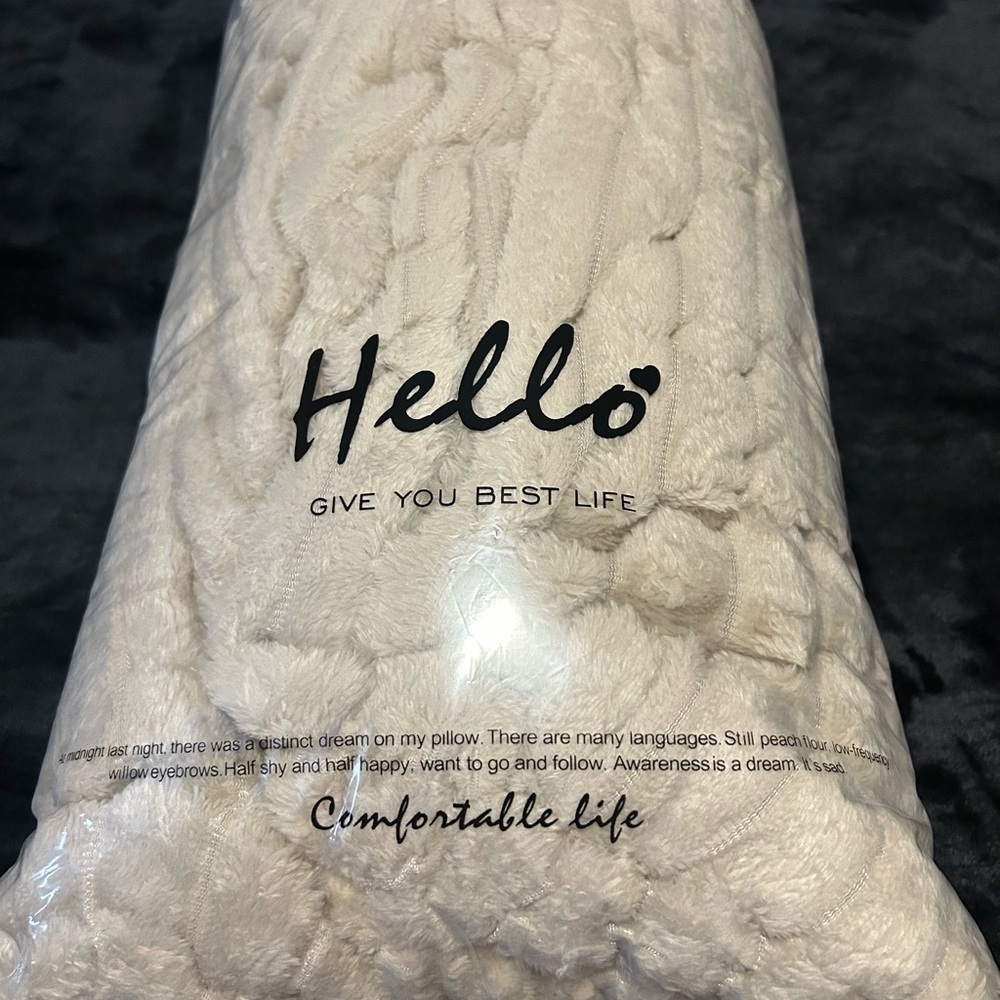 Beige plush blanket 
Full size 
New in drawstring bag